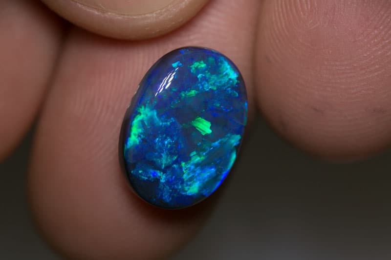 5.93 ct black opal 15x11x5.5mm