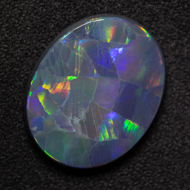 5.67 ct black opal 16x13x4 mm