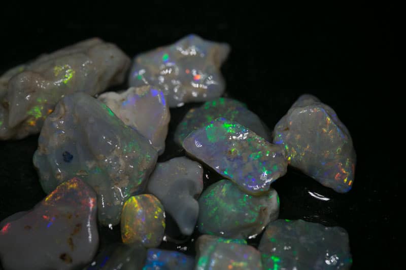 55 ct 16pc rough opal parcel for intermediate cutters