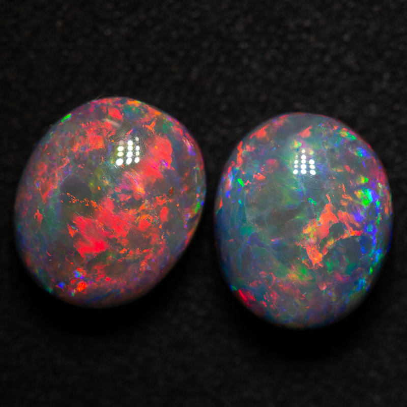 6.12 ct black opal pair 9.4x7.9x6.2mm