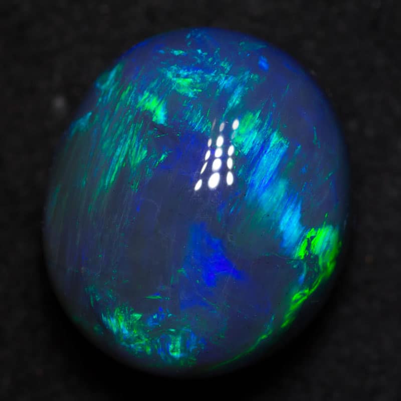 6.19 ct gem black opal 12.2x10.2x8mm
