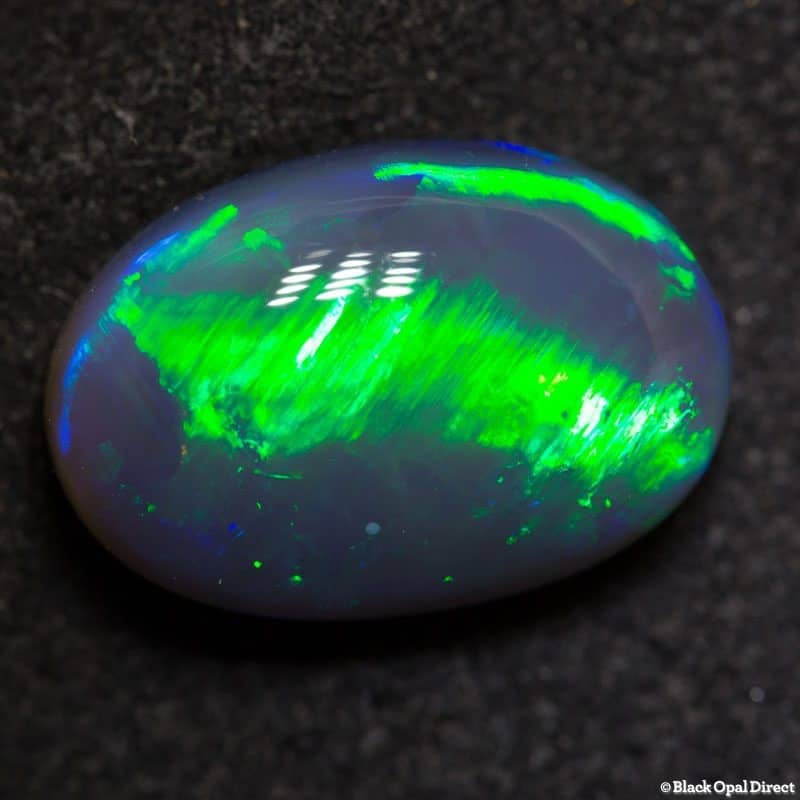 6.30ct cats eye pattern black opal 14.5x10x6.5mm
