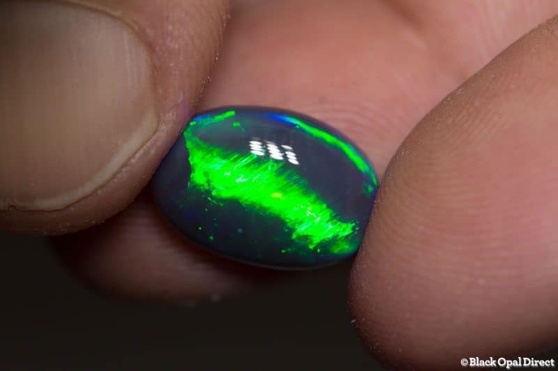 6.30ct cats eye pattern black opal 14.5x10x6.5mm
