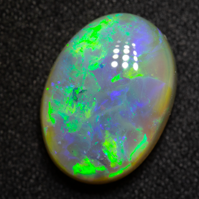 6.32 ct crystal opal 14.4x10.5x6.7mm