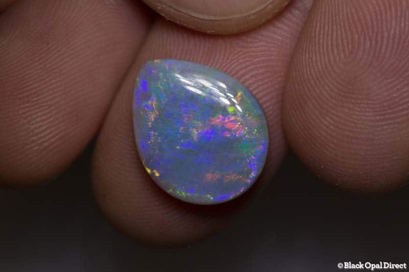 6.33 ct semi black double sided opal 16x13x5.5mm