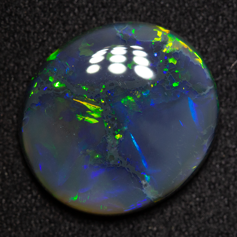 6.44 ct black opal 14.8x13.2x4.5mm