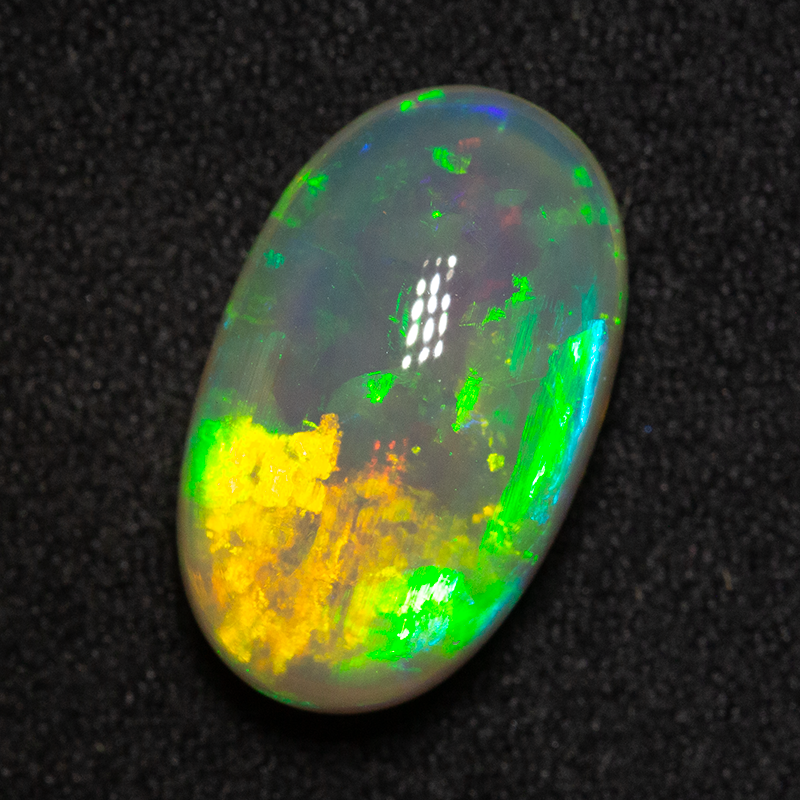 6.95 ct gem crystal opal 15.9x9.7x7.3mm