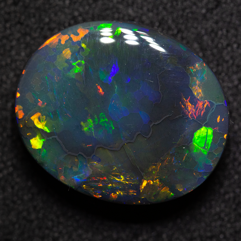6.95 ct gem black opal 15x12x5.5mm