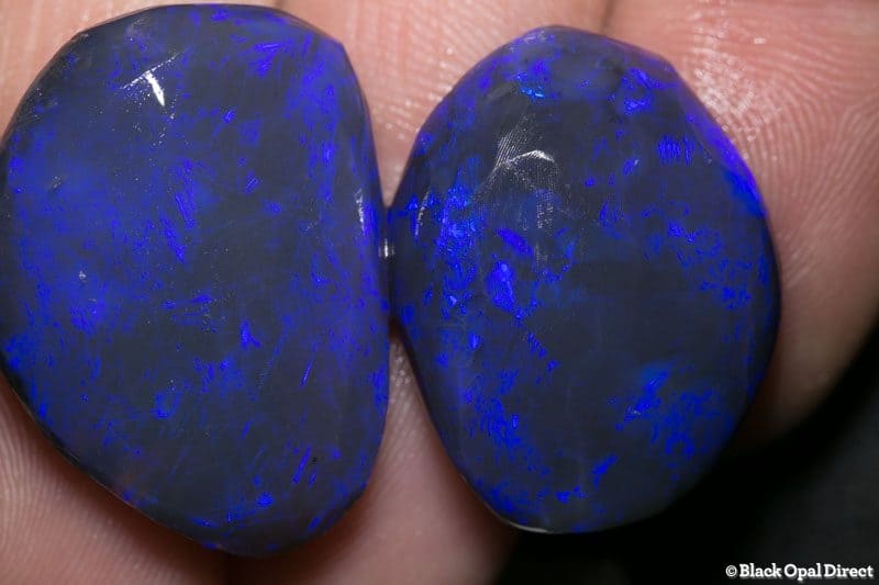69.75ct black opal rubs