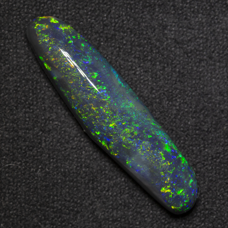 7.01 ct black opal 28x7x5.8mm