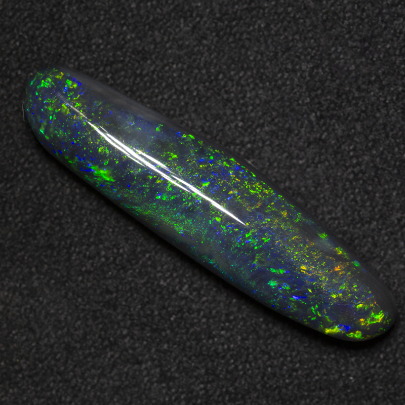 7.01 ct black opal 28x7x5.8mm