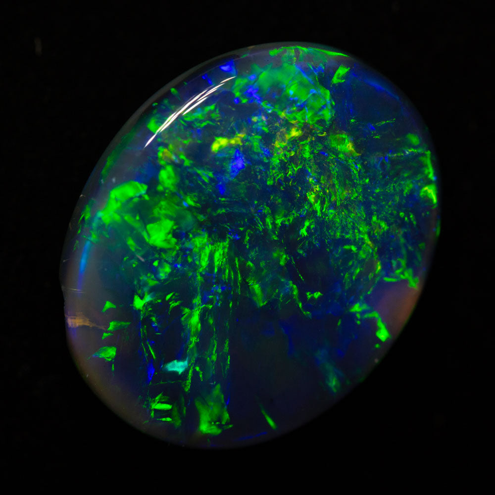 7.05 ct black opal 16.8x13.7x4.7mm