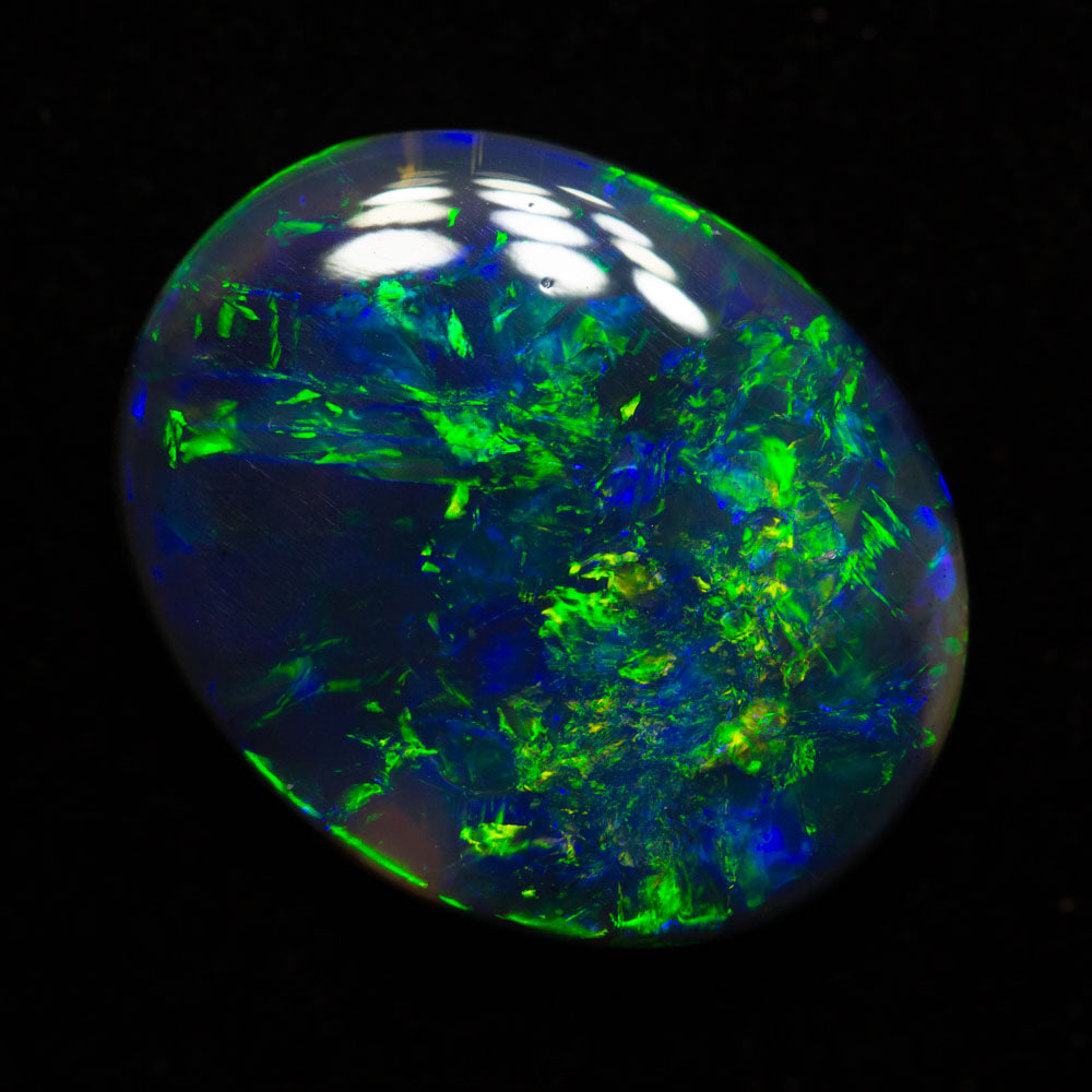 7.05 ct black opal 16.8x13.7x4.7mm