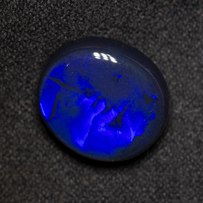 7.21 ct black opal 13.9x12.3x6.9mm