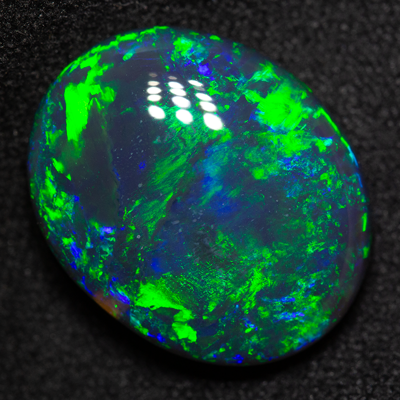7.35 ct black opal 15.7x12.7x5.6mm