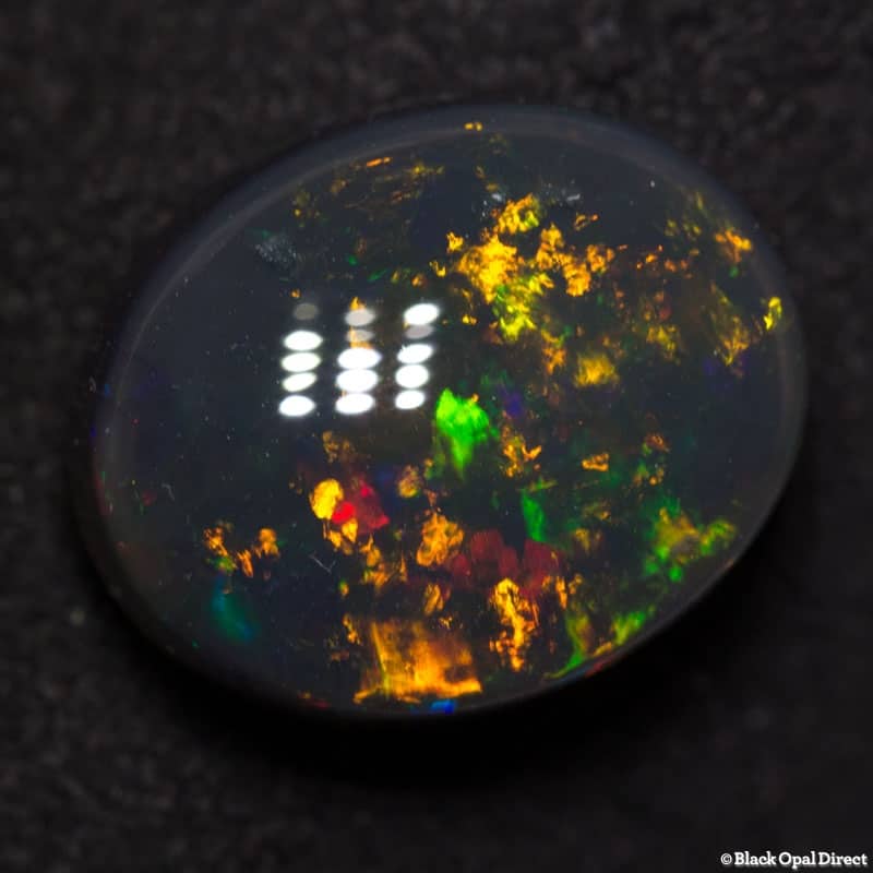 7.35 ct black opal gem 14x12x7mm