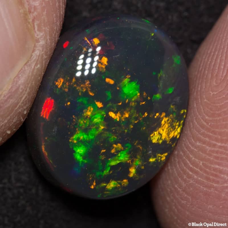 7.35 ct black opal gem 14x12x7mm
