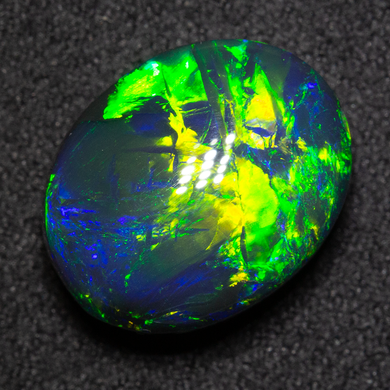 7.55 ct gem black opal 14x11.1x7.4mm