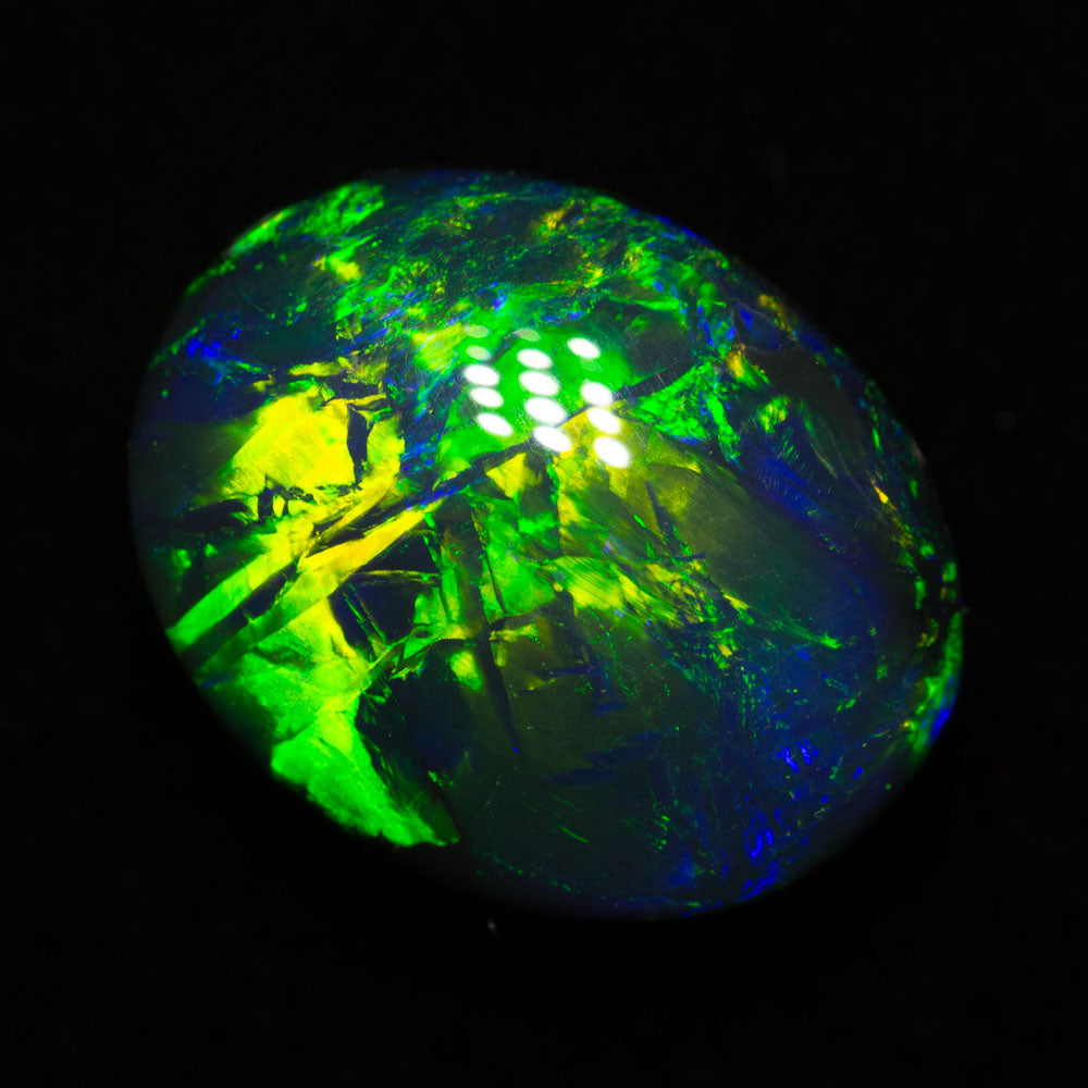 7.55 ct gem black opal 14x11.1x7.4mm