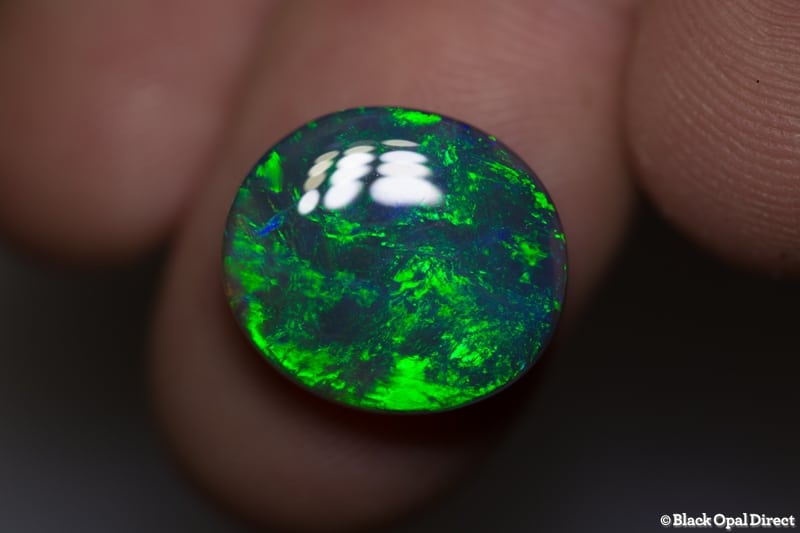7.78 ct green on black opal 15.5x14x5mm