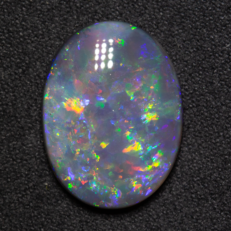 7.82 ct black opal 18x14x5 mm