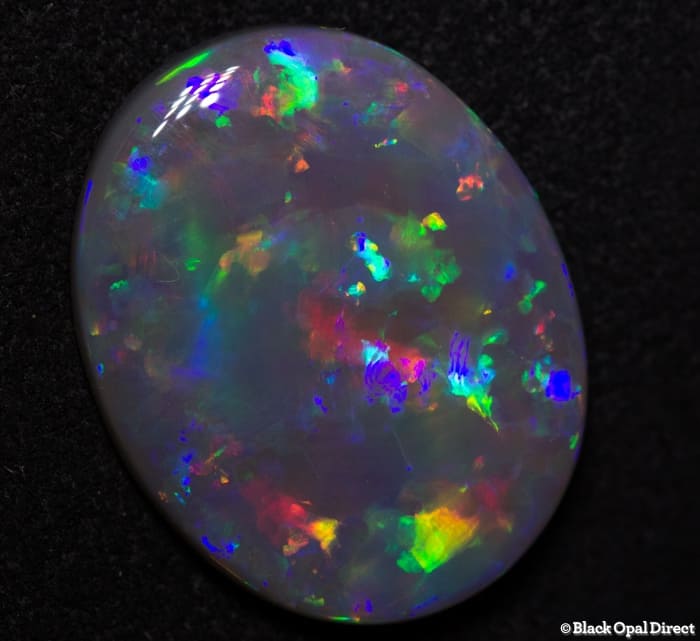 8.19 ct semi black gem opal 19x15x4mm