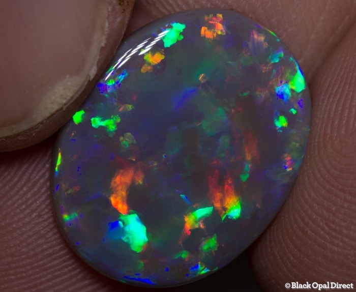 8.19 ct semi black gem opal 19x15x4mm