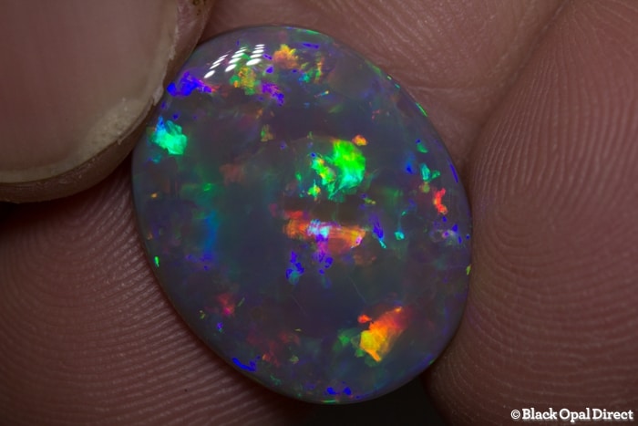 8.19 ct semi black gem opal 19x15x4mm