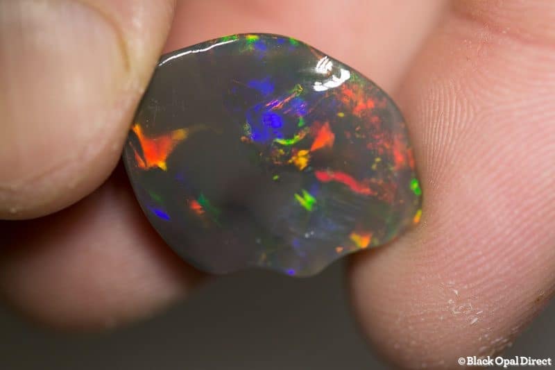16.10 ct black opal carving 22x17x9mm