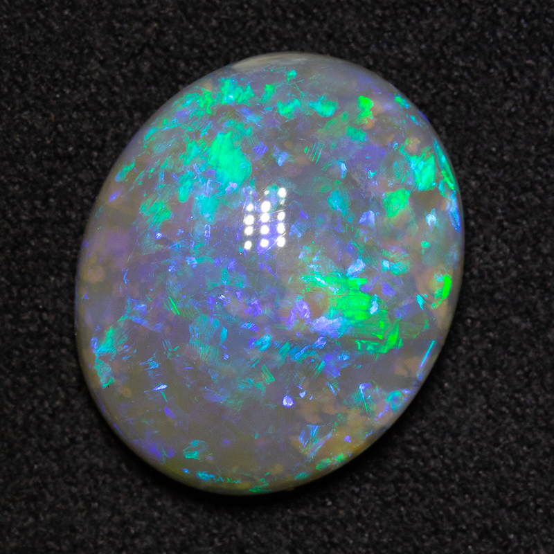 8.56 ct dark opal 16.5x13.7x6.3mm