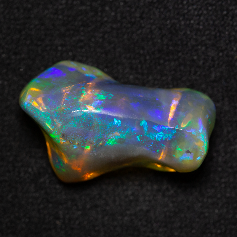 8.73 ct crystal opal carving 17.8x10.1x10.9mm