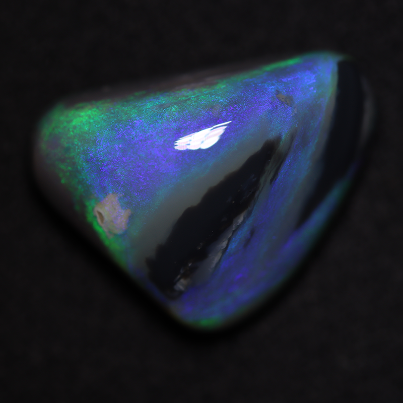 9.17 ct dark opal 17.3x12.9x7.6mm
