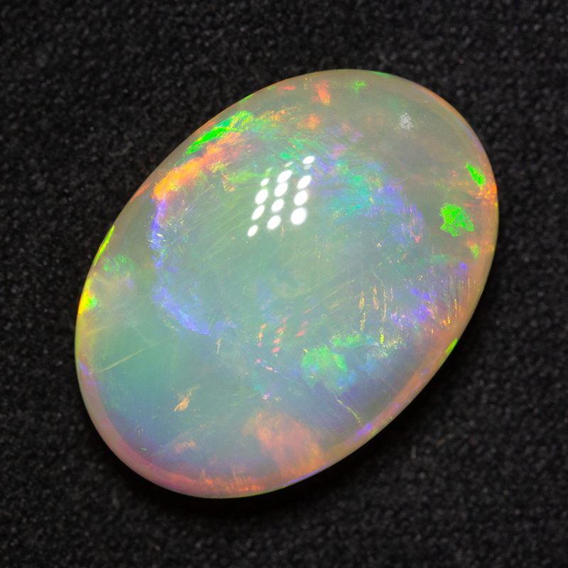 9.17 ct double-sided white opal 17.4x12.4x6.9mm