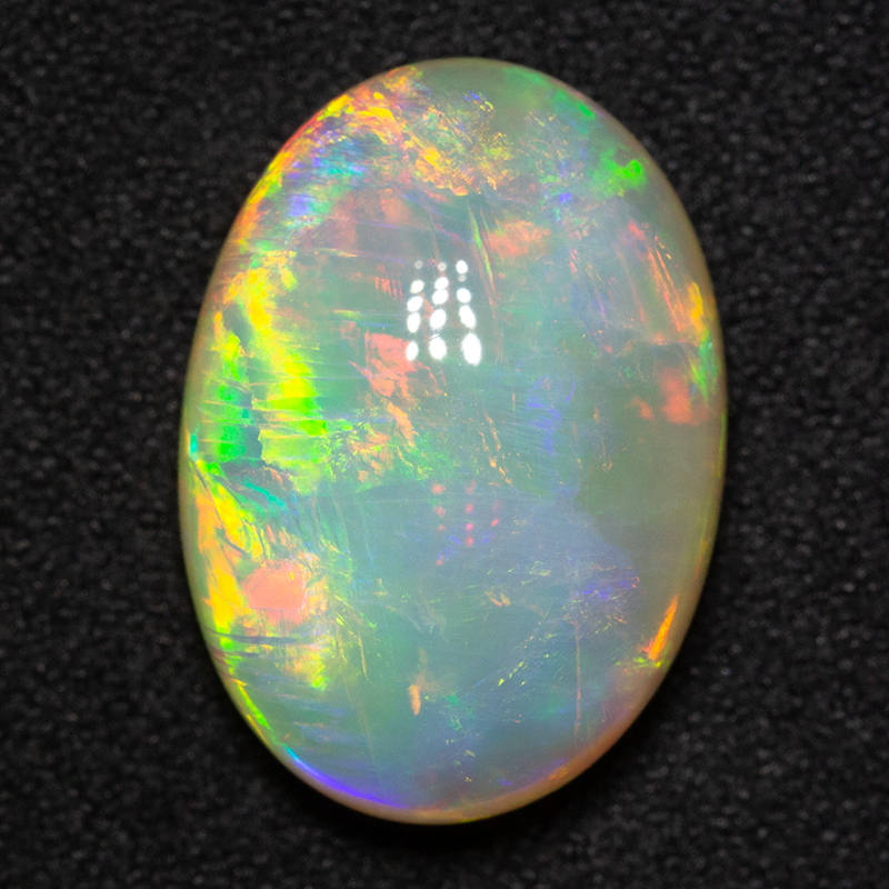 9.17 ct double-sided white opal 17.4x12.4x6.9mm