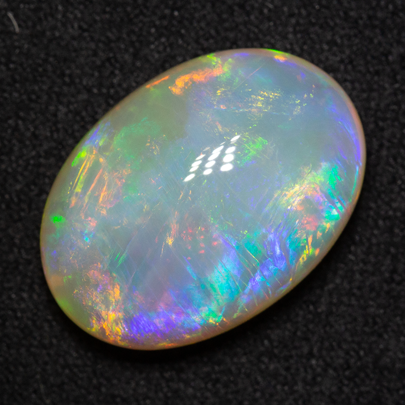9.17 ct double-sided white opal 17.4x12.4x6.9mm