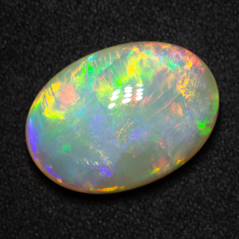 9.17 ct double-sided white opal 17.4x12.4x6.9mm