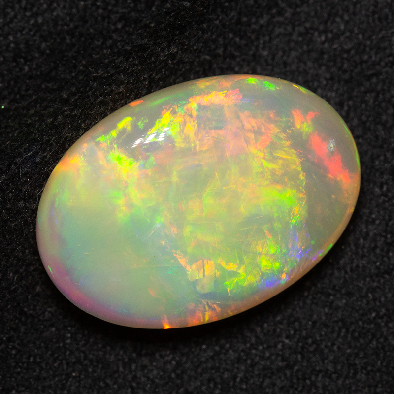 9.17 ct double-sided white opal 17.4x12.4x6.9mm