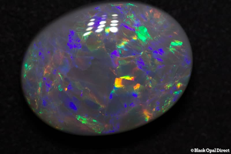 9.30 ct semi black opal 18x13.2x6mm