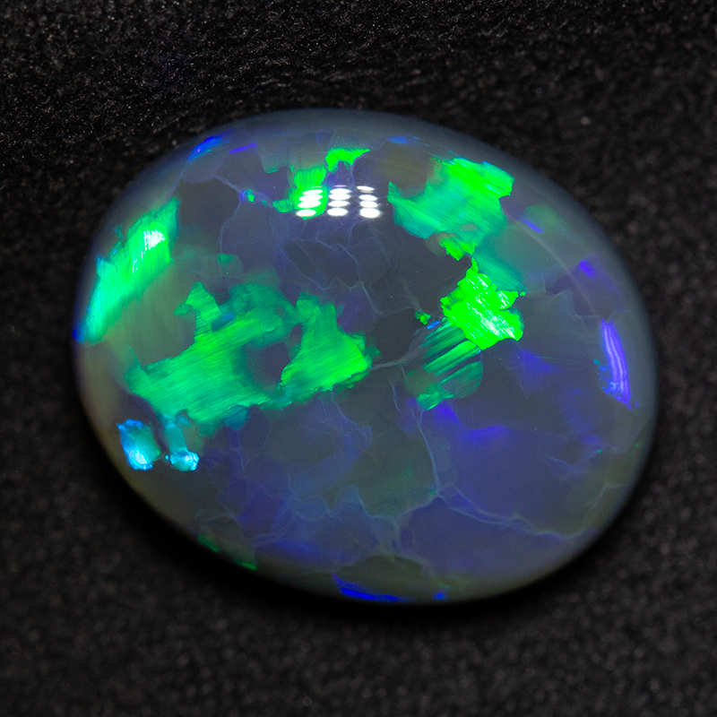 9.32 ct black opal 16.6x13.4x6.4mm
