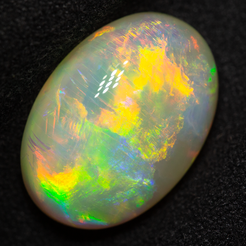 9.17 ct double-sided white opal 17.4x12.4x6.9mm