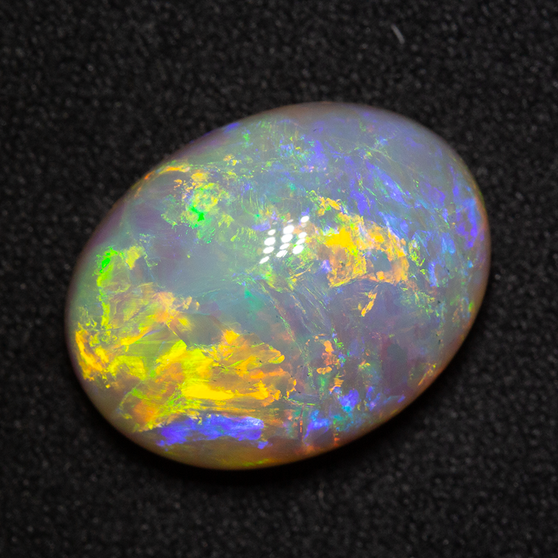 9.51 ct double-sided crystal opal 16.7x12.7x7.7mm