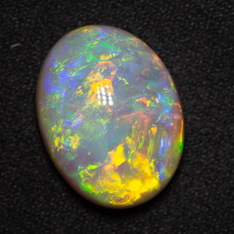 9.51 ct double-sided crystal opal 16.7x12.7x7.7mm