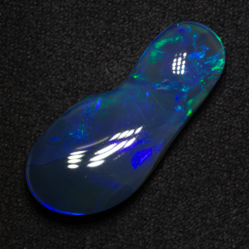 9.55 ct black opal foot 24.6x11.2x5.6mm