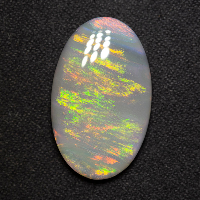 9.64 ct dark opal 22.4x13.8x4.9mm