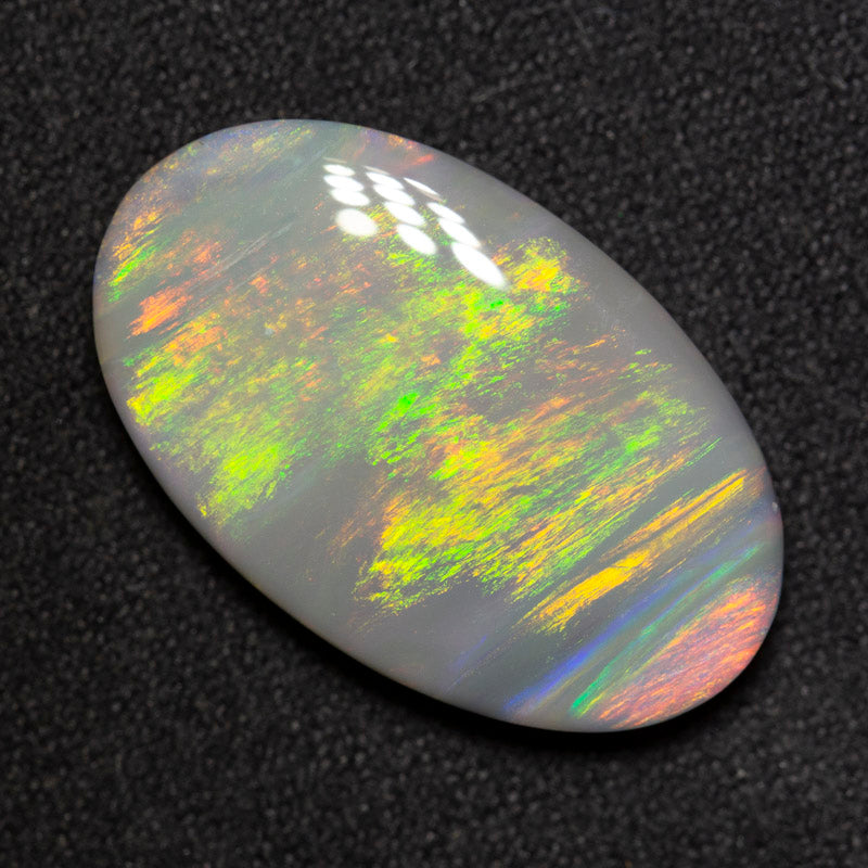 9.64 ct dark opal 22.4x13.8x4.9mm