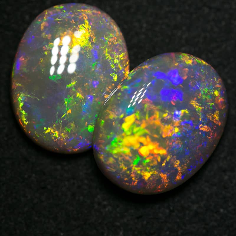 9.68 ct dark opal pair 14x11x4.5-5mm