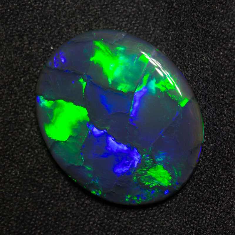 9.87 ct gem black opal 20.6x17.1x4.3mm