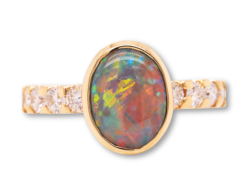 18 kt yellow gold black opal engagment ring with diamonds