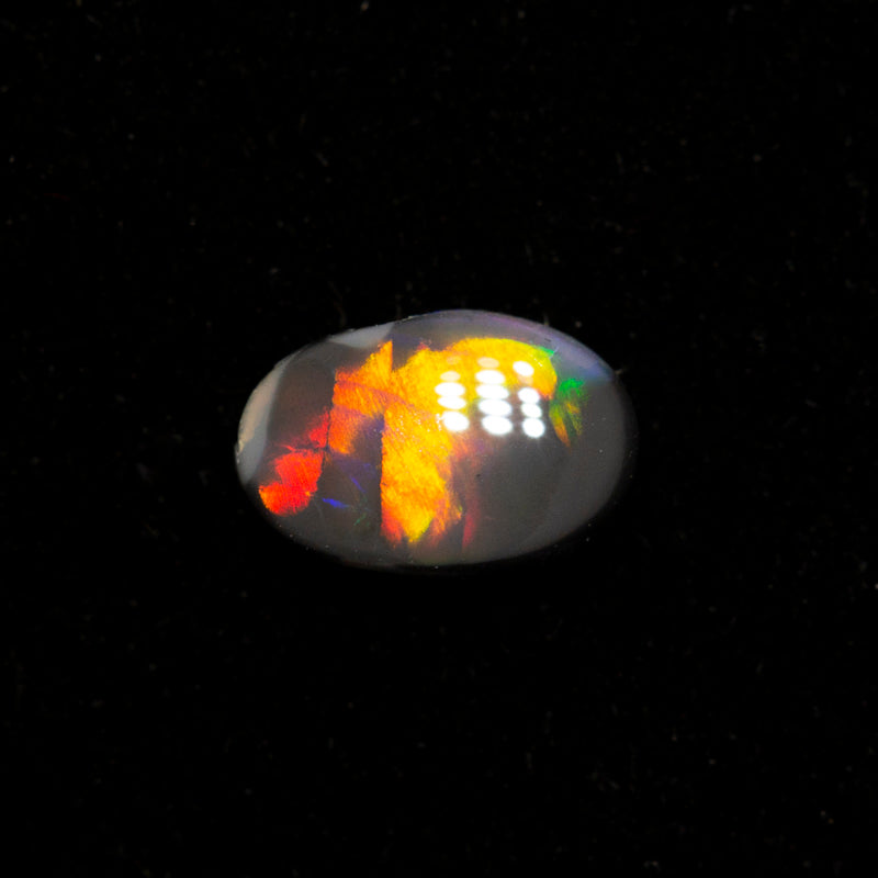 0.17 ct black opal 5.3x3.6x1.5mm