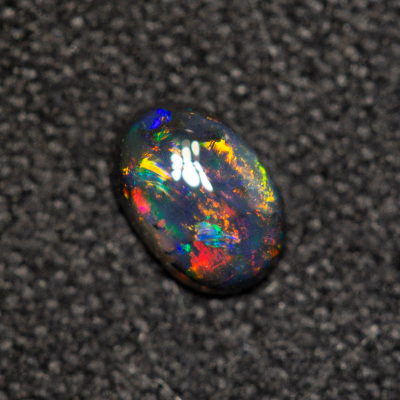 0.18 ct black opal 4.9x3.3x1.7mm